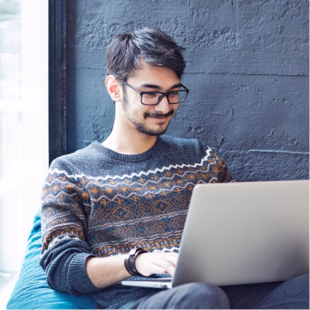 A man working from home serviing as an AI Agent Developer
